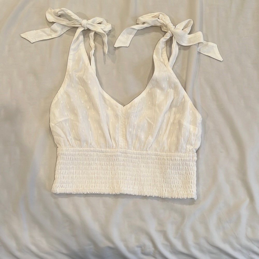 Hollis yet the white top